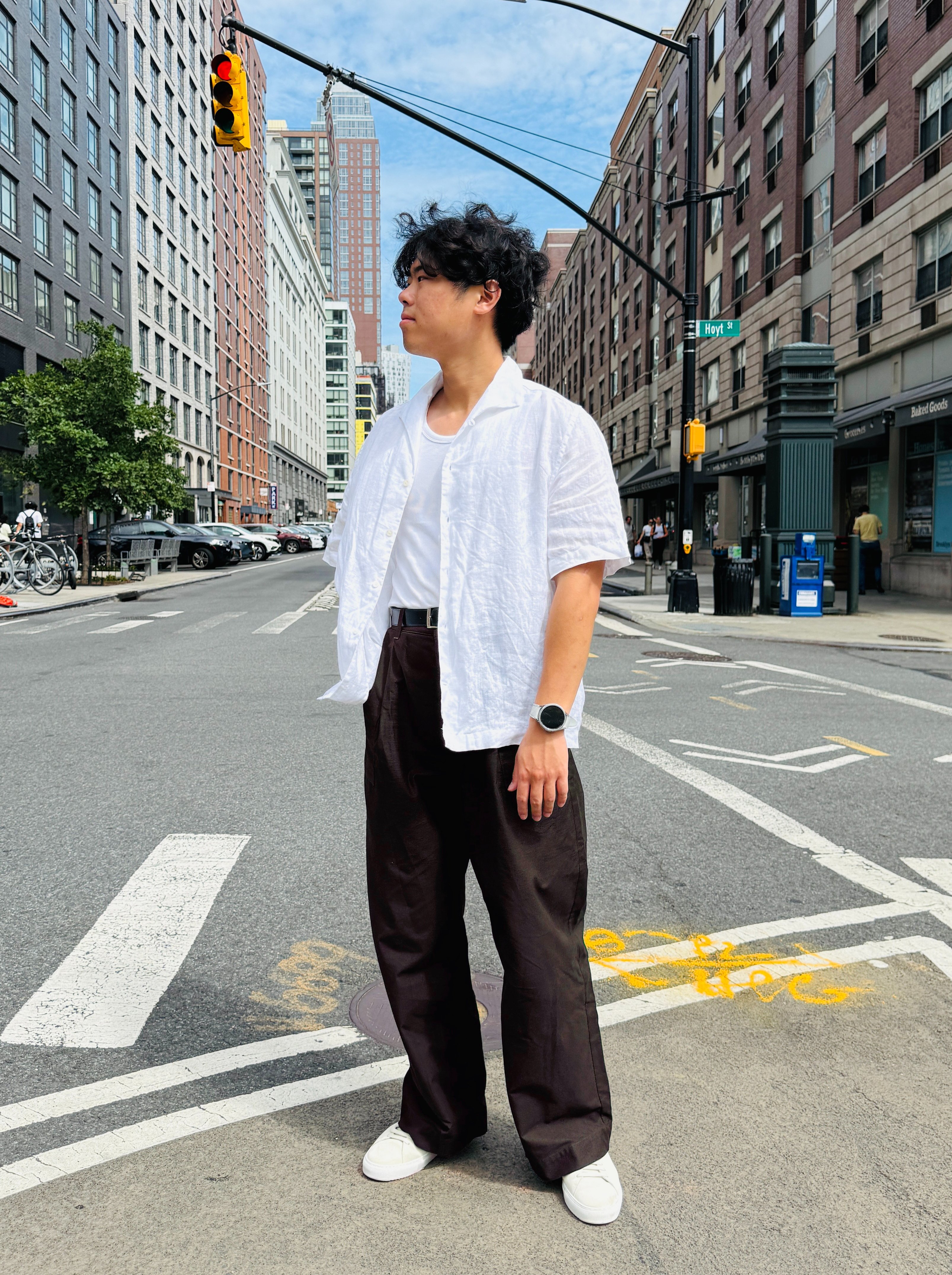 Person standing in the streets of New York City.