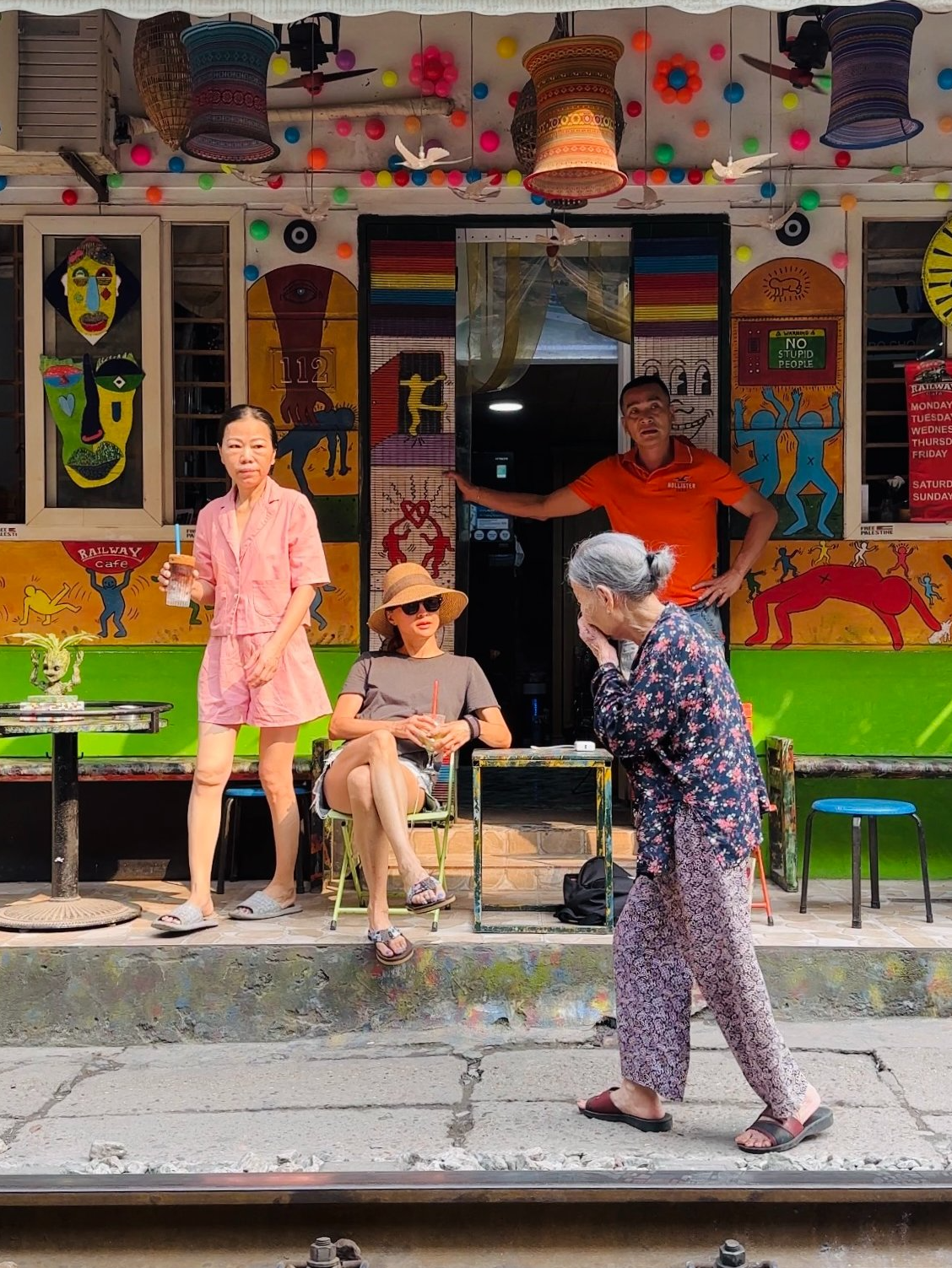 Elderly woman walking in Hanoi streets