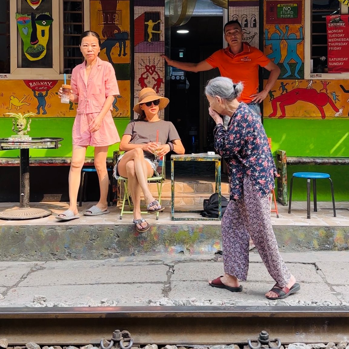 Elderly woman walking in Hanoi
