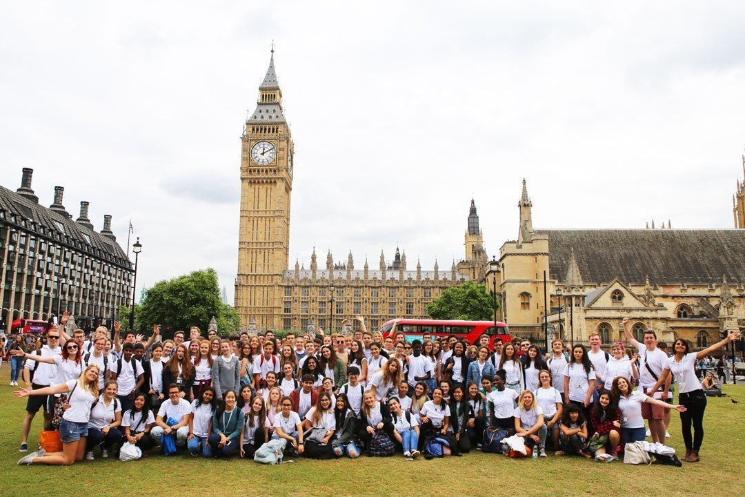 The Ingenium Academy - students sightseeing outside the Houses of Parliament in Parliament Square, London