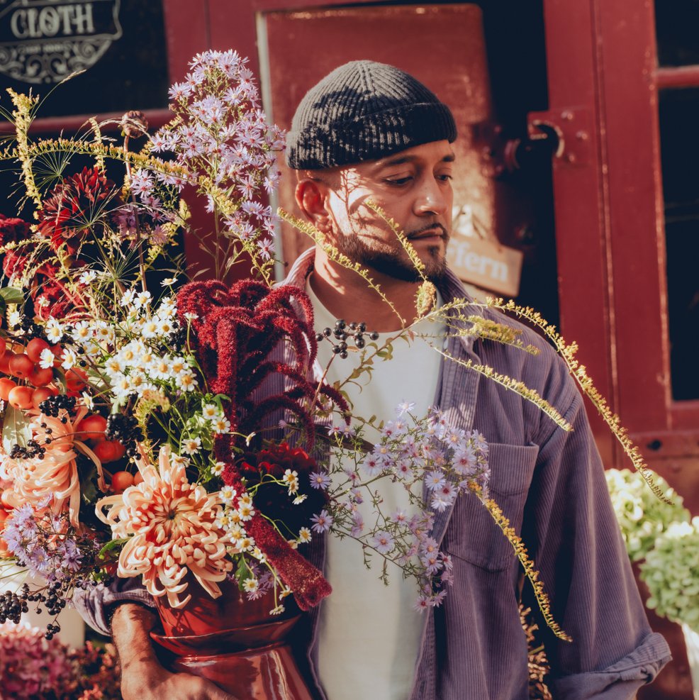 Horticulture expert Errol Reuben Fernandes and a magnificent flower arrangement