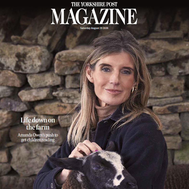 Amanda Owen tending to a lamb on her farm for the front cover of The Yorkshire Post magazine