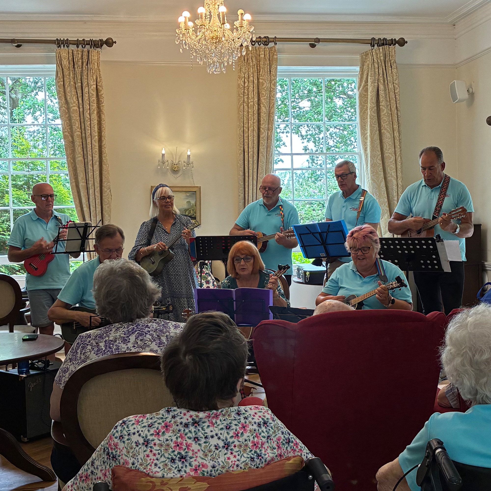 The Stokes Bay Strummers perform for residents