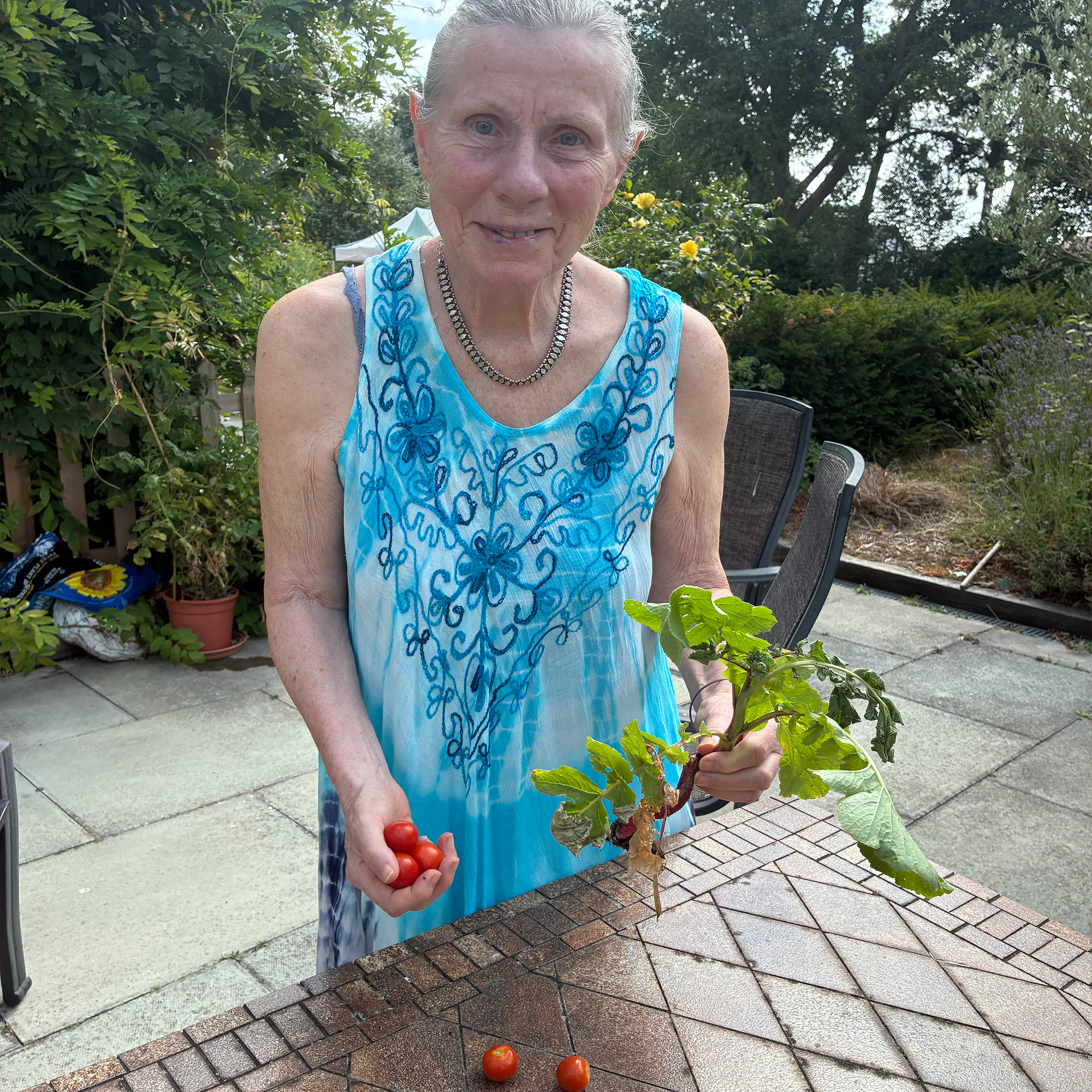 Blackbrook House Care Home resident with home-grown produce